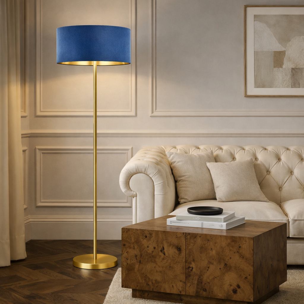 Living room with a blue lamp, beige sofa, and wooden coffee table.