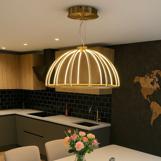 Modern kitchen with a gold pendant light fixture.