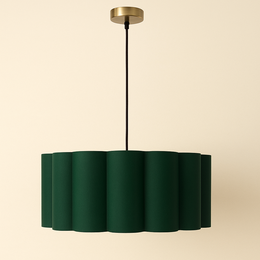 Green pendant lamp with a gold fixture on a beige background