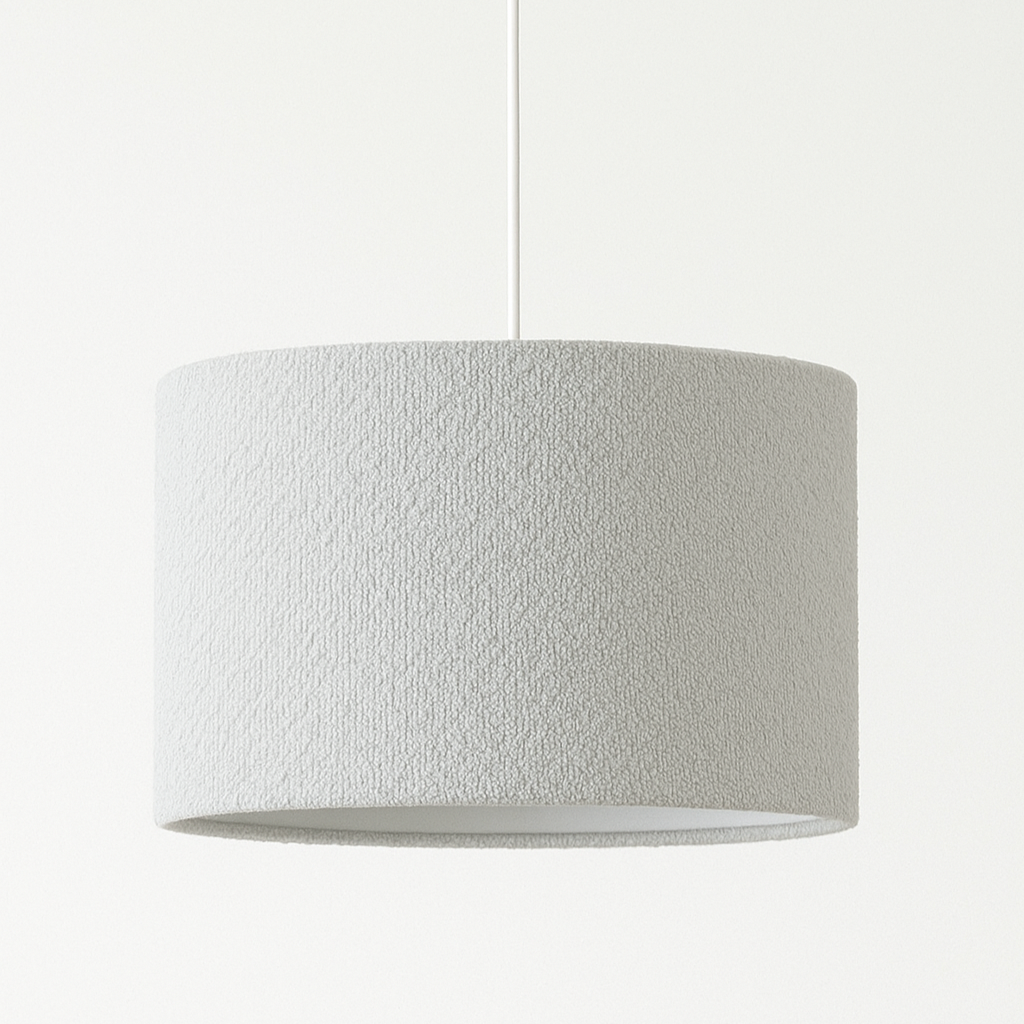 White pendant lamp with textured shade on a white background
