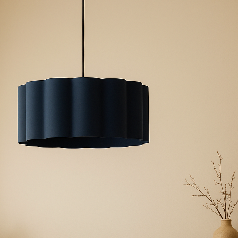 Black wavy pendant light on a beige background