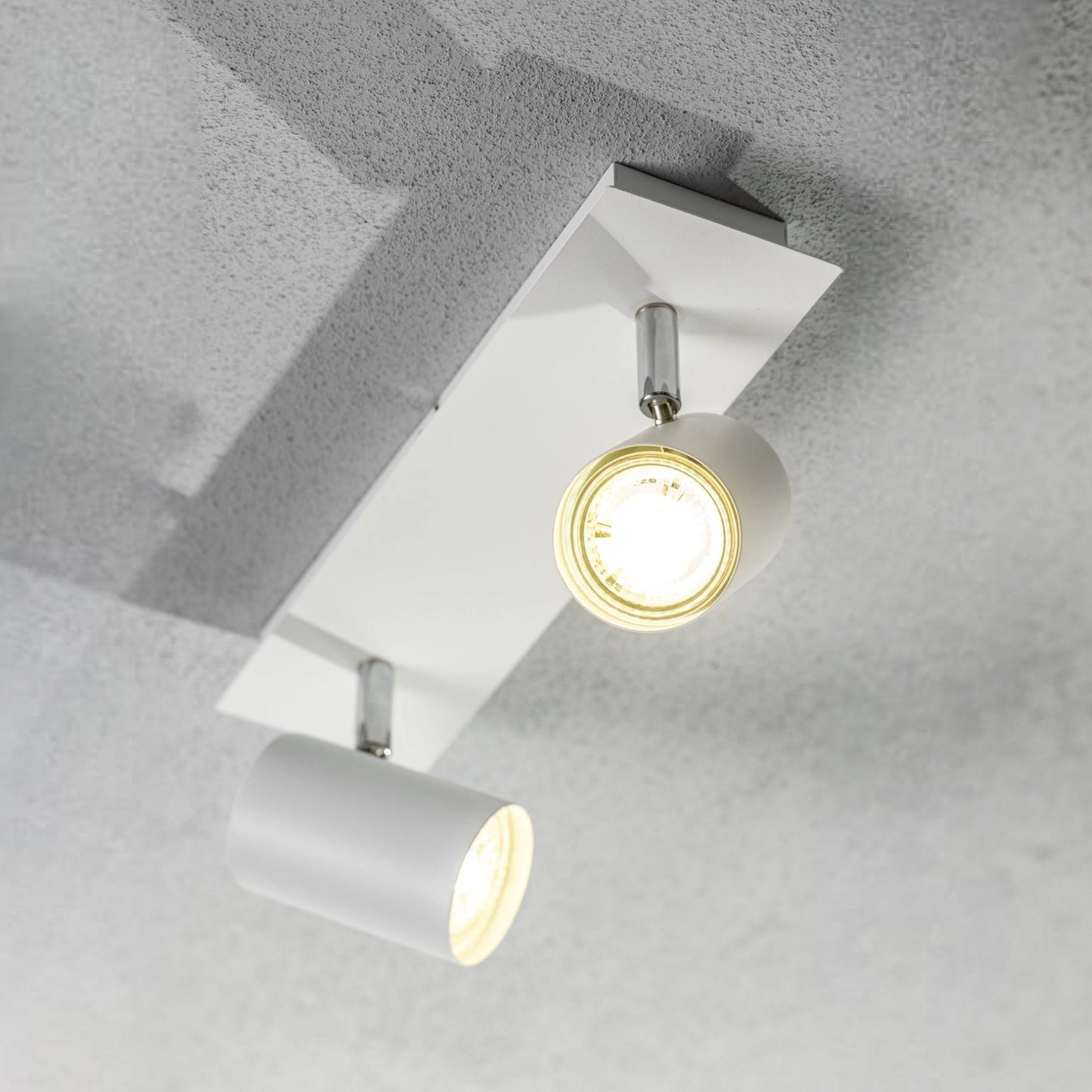 Add an industrial style to your home with the VENETO  spotlight light finished in white. The lamp is also ideal for task lighting due to the adjustable heads providing a focused beam. The simplistic design of this light fitting makes it suitable for all interior styles.