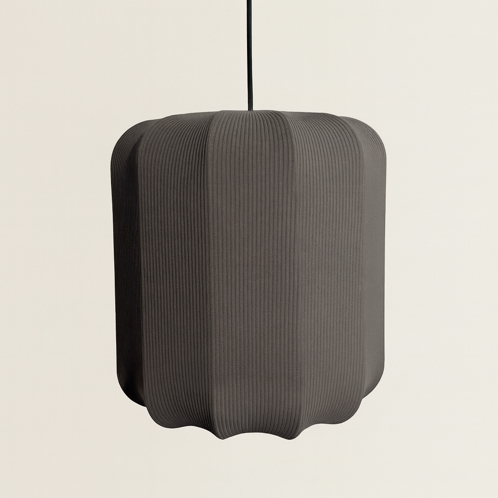 Textured gray pendant light on a beige background