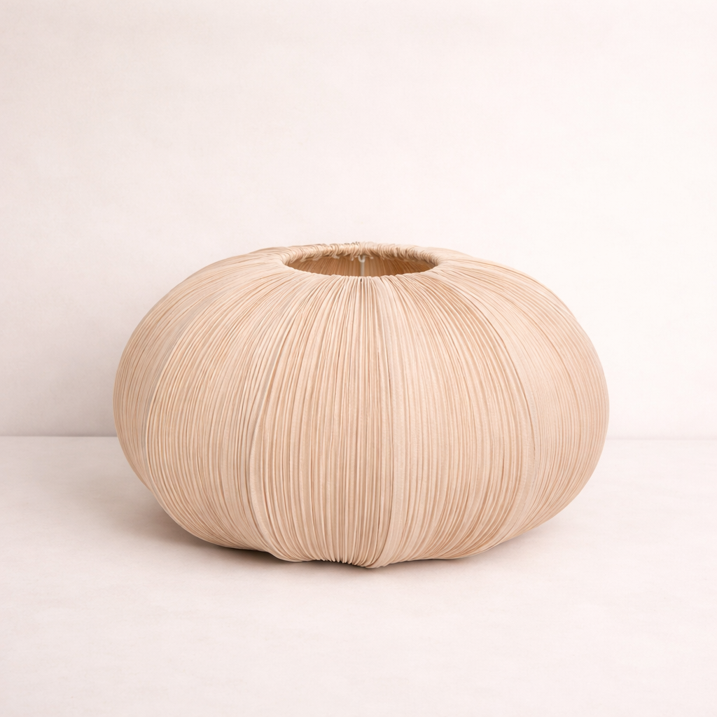 Beige woven basket on a light beige background