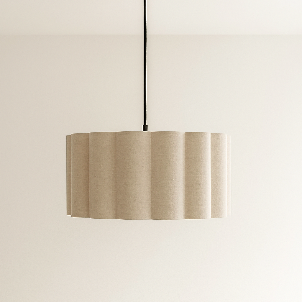 Ceiling light fixture with beige lampshade on a plain background