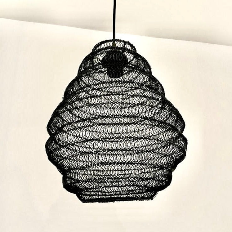 Bring a Moroccan twist to your home décor with the delicately crafted Casablanca ceiling light. Made in an intricate design from black metal wire this large statement light would look fabulous in both living and dining spaces, as well as bedrooms. When switched on the light shines through the shade creating a spectacular pattern on the ceiling and walls.