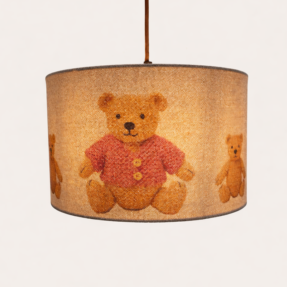 Lampshade with teddy bear design on a plain background