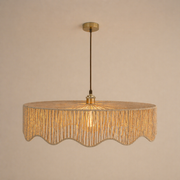 Decorative pendant light with a textured shade on a beige background
