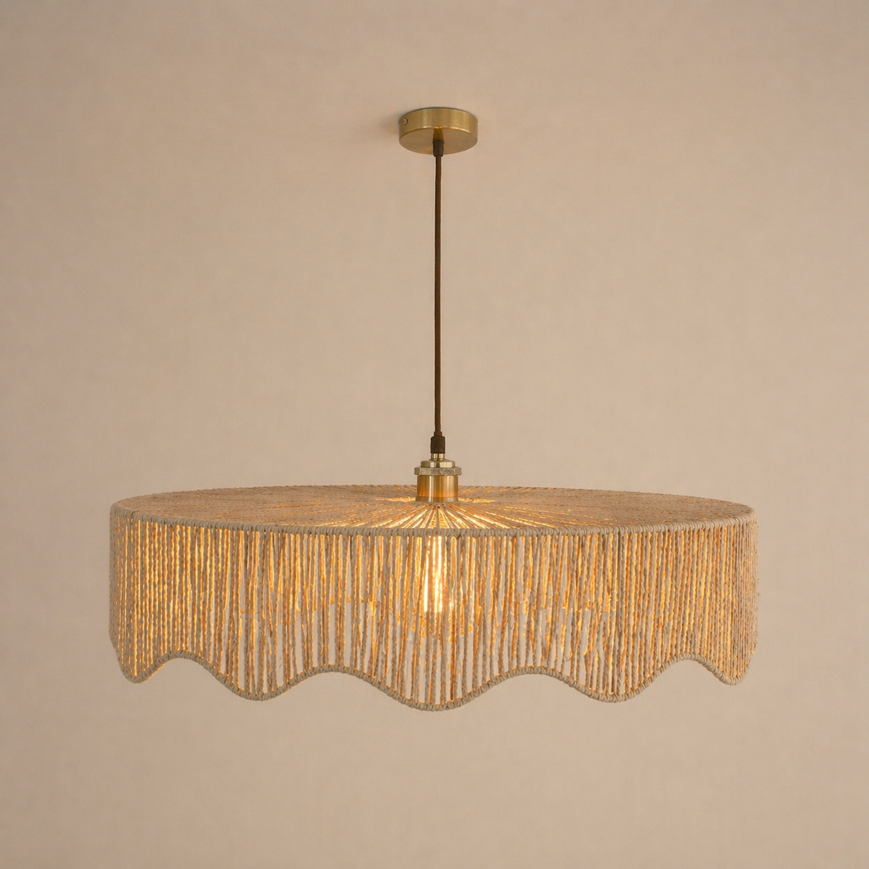 Decorative pendant light with a textured shade on a beige background