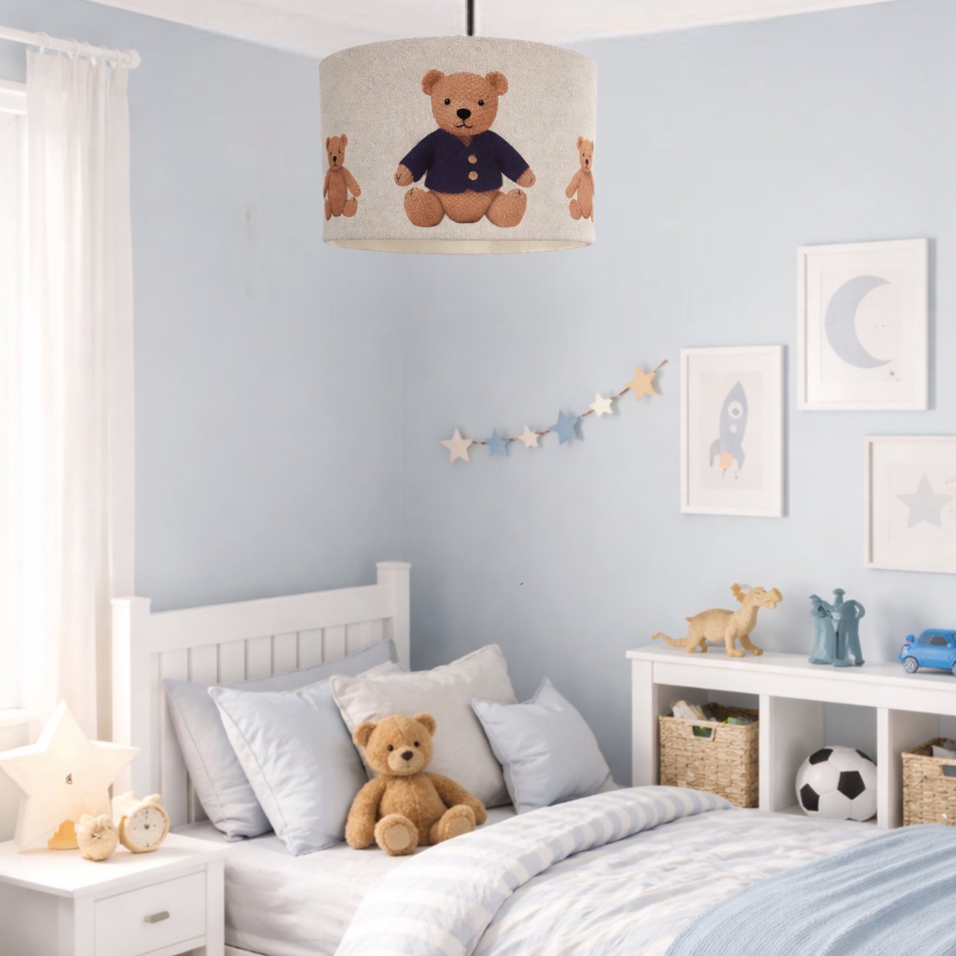 Children's bedroom with light blue walls, teddy bear decorations, and a lampshade.