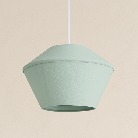 Light green pendant lamp on a beige background