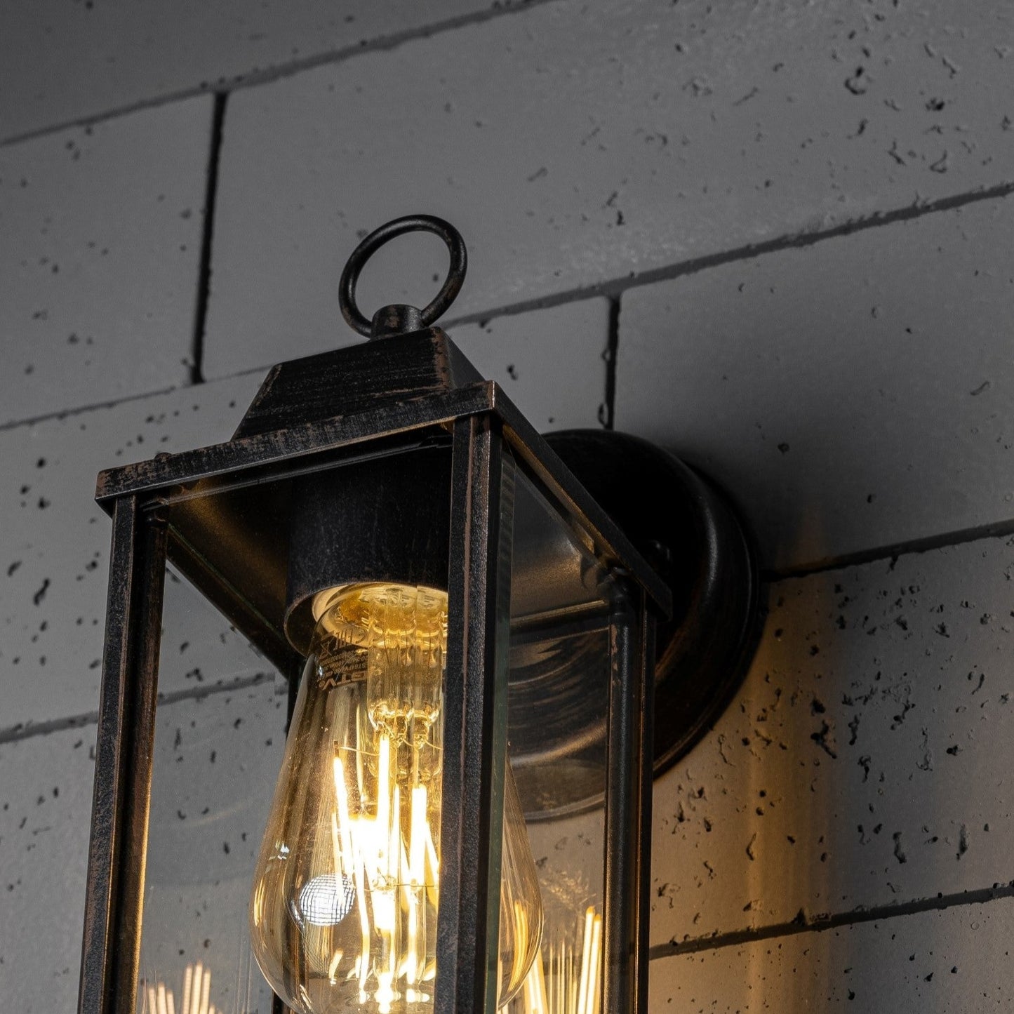 If you’re looking for a modern take on a traditional outdoor wall light, this glass coach wall light is perfect for adding style and protection for your home. This classic lantern light is designed with a contemporary twist, styled with a cuboid shape and fitted with glass windows that allow the light to shine effectively.&nbsp;