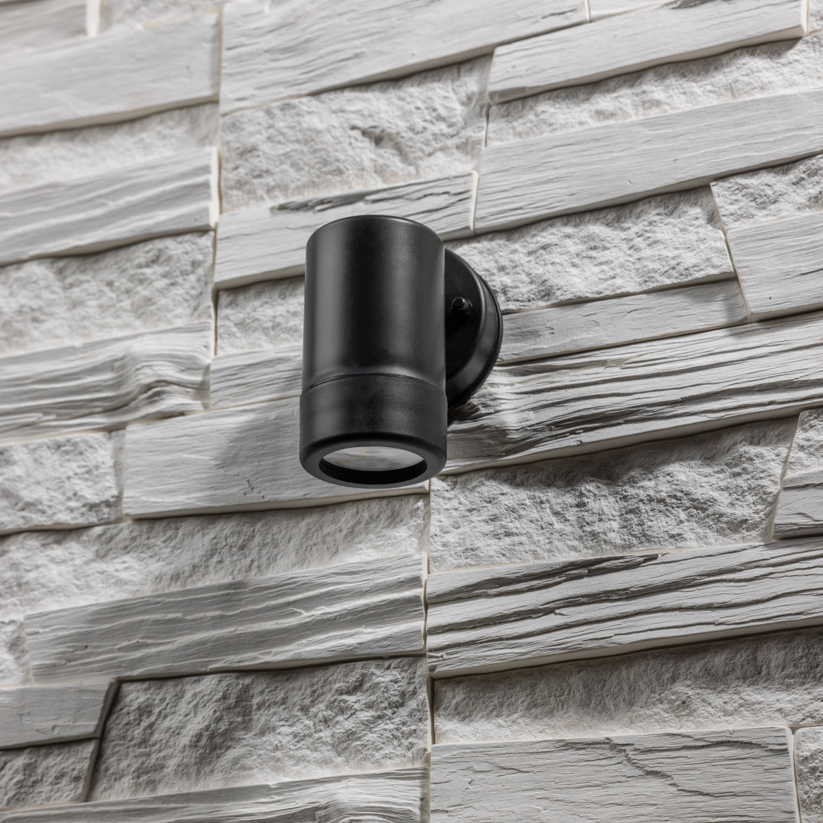 Our Valentine black outdoor single spot wall light would look perfect in a modern or more traditional home design. Outside wall lights can provide atmospheric light in your garden, at the front door or on the terrace as well as a great security solution. It is designed for durability and longevity with its robust material producing a fully weatherproof and water resistant light fitting