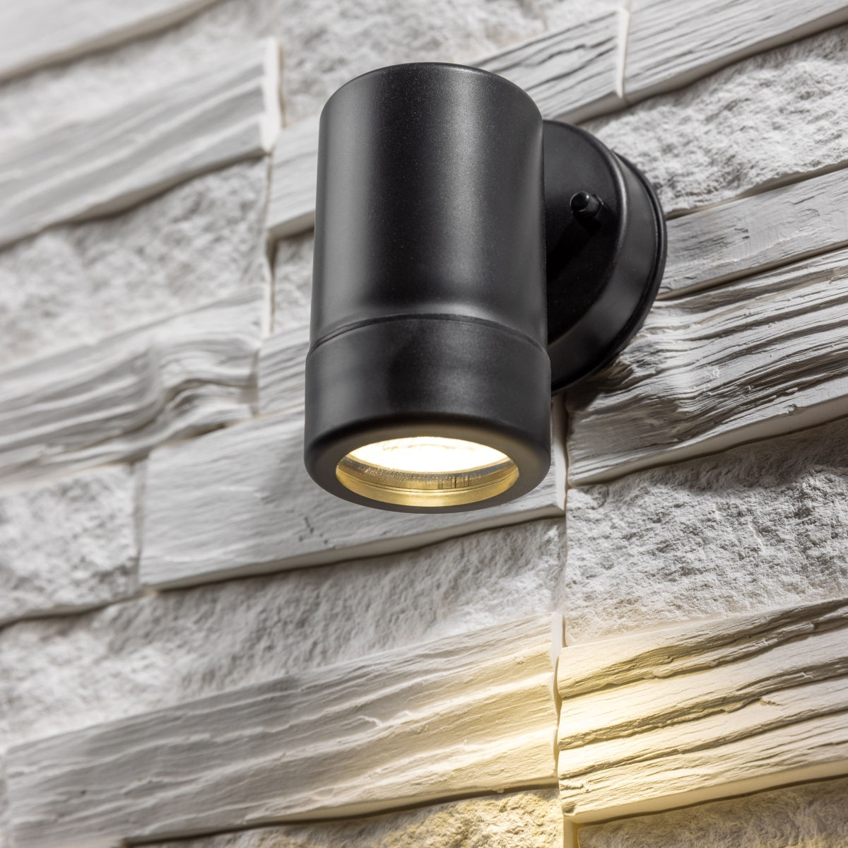 Our Valentine black outdoor single spot wall light would look perfect in a modern or more traditional home design. Outside wall lights can provide atmospheric light in your garden, at the front door or on the terrace as well as a great security solution. It is designed for durability and longevity with its robust material producing a fully weatherproof and water resistant light fitting