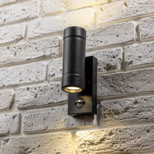 Our Valentine black outdoor wall mounted up and down cylinder outdoor light with motion sensor would look perfect in a modern or more traditional home design. Outside wall lights can provide atmospheric light in your garden, at the front door or on the terrace as well as a great security solution.