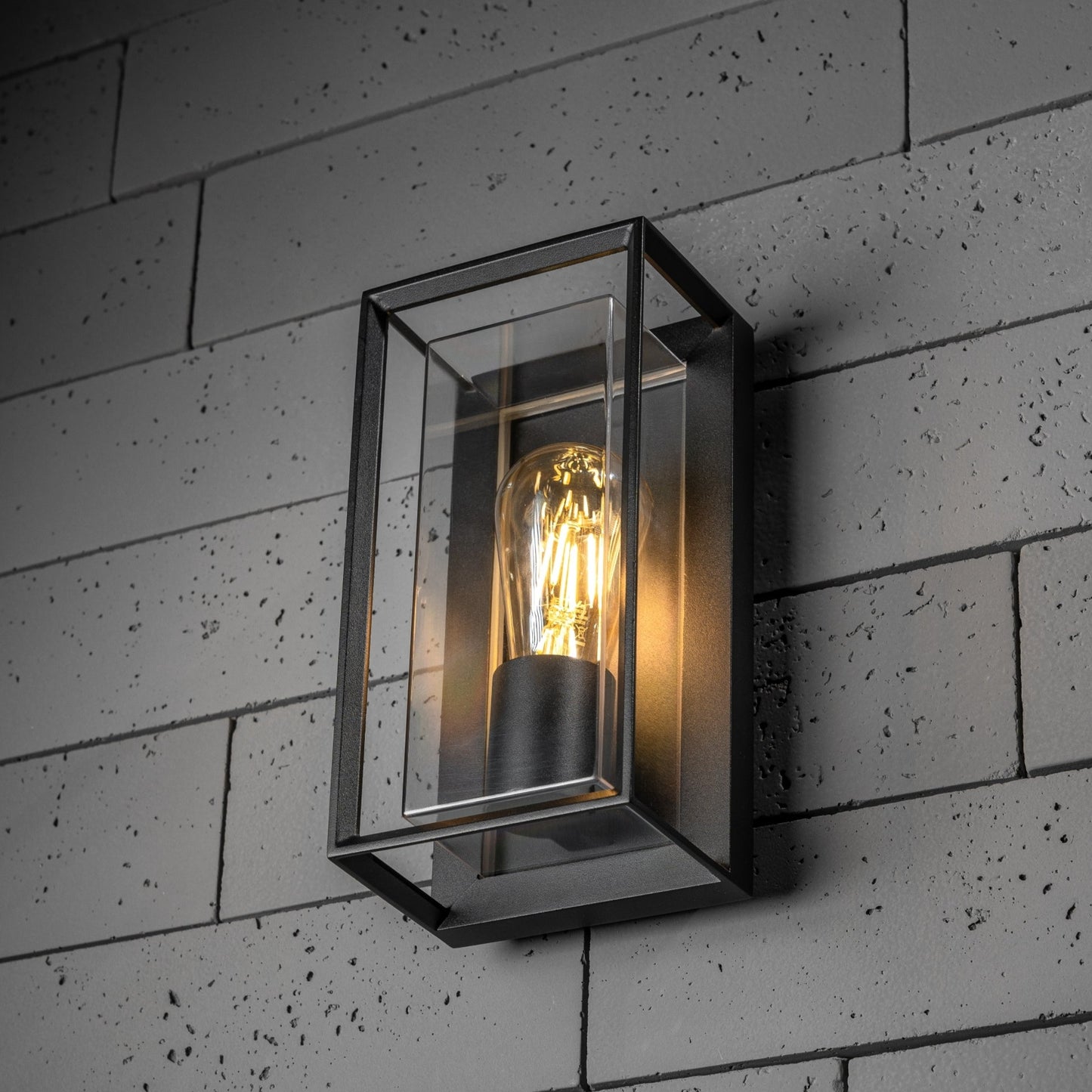 Our Floriana black aluminium outdoor wall mounted lantern outdoor light with clear polycarbonate diffusers would look perfect in a modern or more traditional home design.