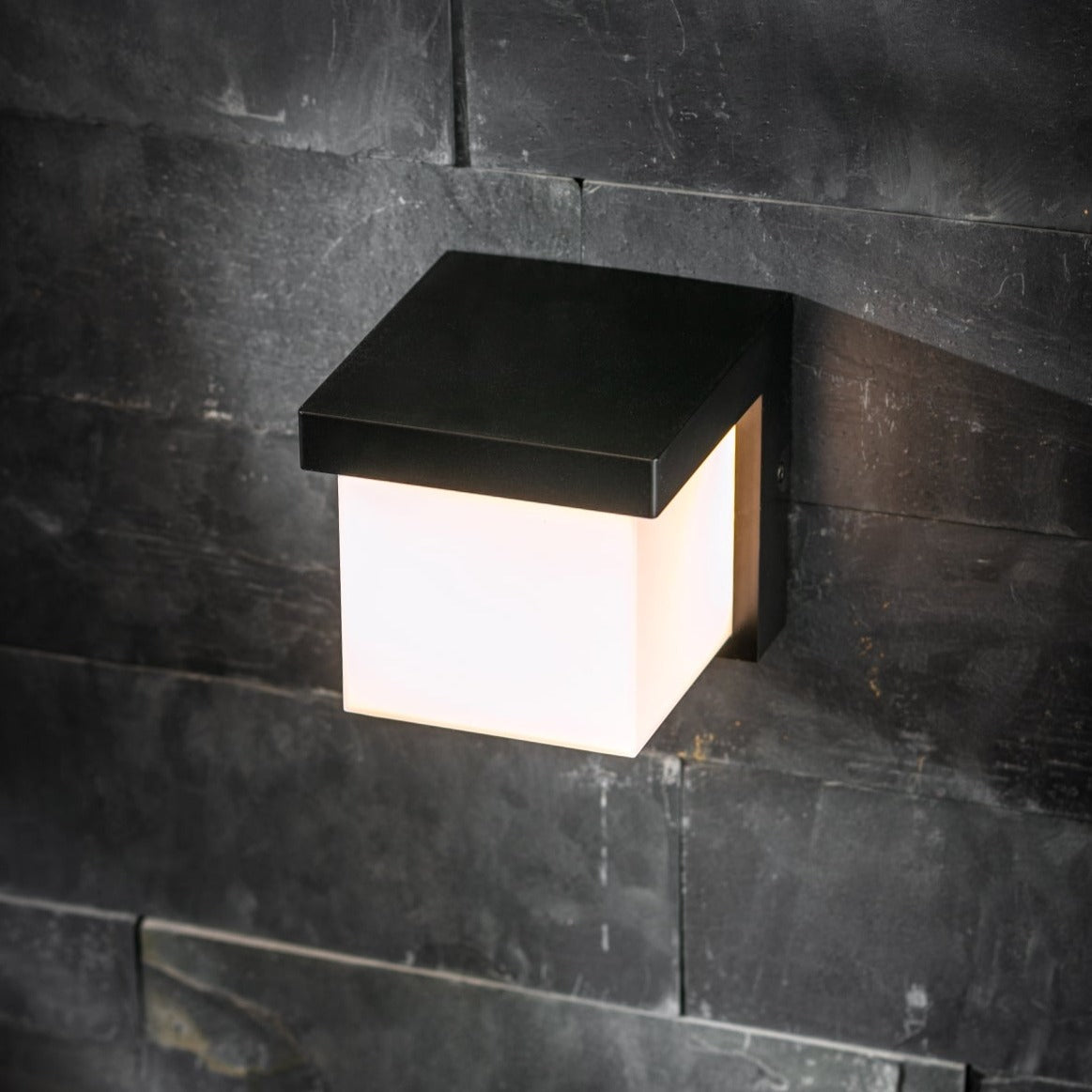 Our Addison black plastic ABS plastic outdoor wall mounted square outdoor light with built in LED's and motion sensor would look perfect in a modern or more traditional home design. Outside wall lights can provide atmospheric light in your garden, at the front door or on the terrace as well as a great security solution. It is designed for durability and longevity with its robust material producing a fully weatherproof and water resistant light fitting.
