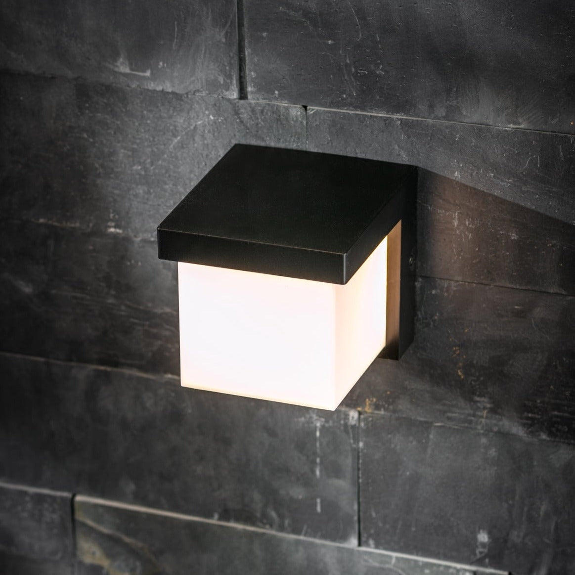 Our Addison black plastic ABS plastic outdoor wall mounted square outdoor light with built in LED's would look perfect in a modern or more traditional home design. Outside wall lights can provide atmospheric light in your garden, at the front door or on the terrace as well as a great security solution. It is designed for durability and longevity with its robust material producing a fully weatherproof and water resistant light fitting.