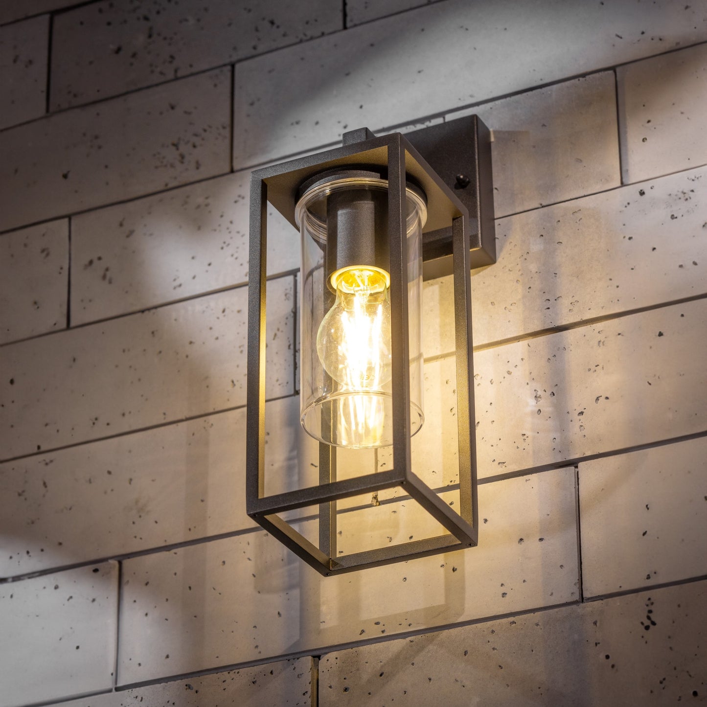 If you’re looking for a modern take on a traditional outdoor wall light, this black lantern  wall light with clear diffuser is perfect for adding style and protection for your home. This classic design with a contemporary twist, styled with a metal lantern shape and fitted with a cylinder diffuser that allows the light to shine effectively.