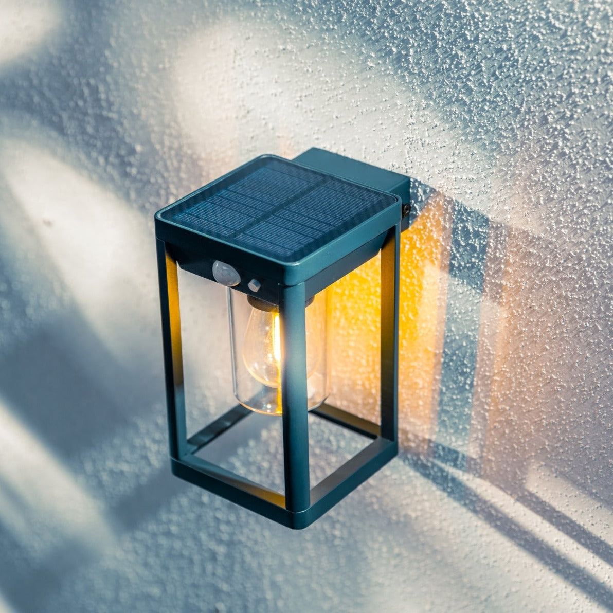 Create an aesthetically pleasing lighting system around your home with our Mase solar lantern light for your walls. This product is featured as an elegant and traditional lantern wall light design, constructed from anthracite grey die cast aluminium and fitted with clear polycarbonate cylinder diffuser