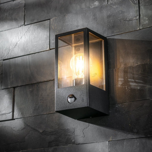 Our Marina black aluminium outdoor wall mounted lantern outdoor light with clear polycarbonate diffusers would look perfect in a modern or more traditional home design. Outside wall lights can provide atmospheric light in your garden, at the front door or on the terrace as well as a great security solution.