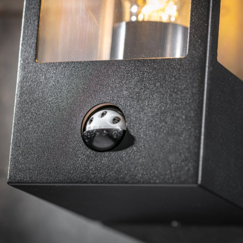 Our Marina black aluminium outdoor wall mounted lantern outdoor light with clear polycarbonate diffusers would look perfect in a modern or more traditional home design. Outside wall lights can provide atmospheric light in your garden, at the front door or on the terrace as well as a great security solution.