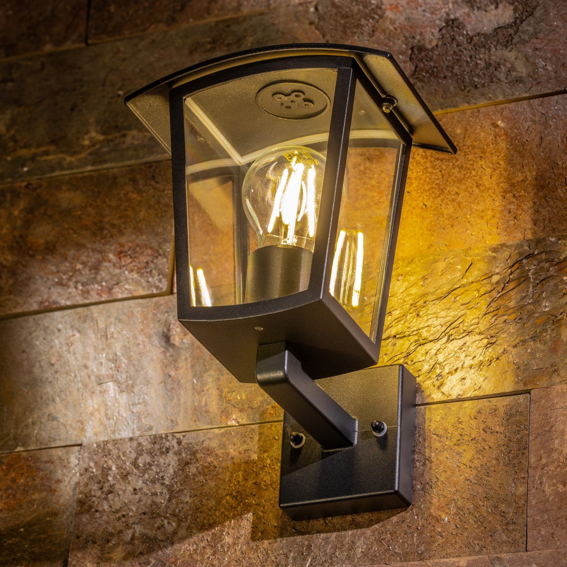 Our Marina black aluminium outdoor wall mounted lantern outdoor light with clear polycarbonate diffusers would look perfect in a modern or more traditional home design. Outside wall lights can provide atmospheric light in your garden, at the front door or on the terrace as well as a great security solution. It is designed for durability and longevity with its robust material producing a fully weatherproof and water resistant light fitting.