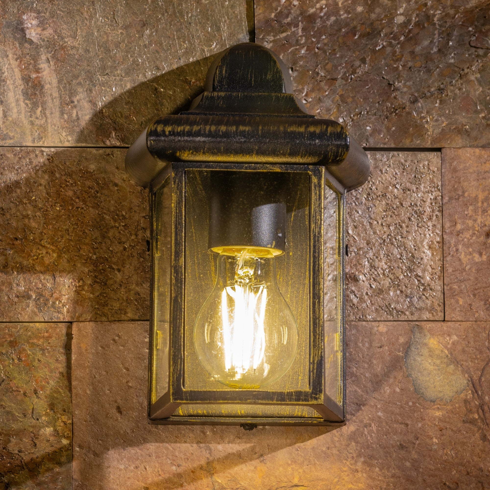 Our Camila wall lantern light is styled with a sophisticated black and bronze colour scheme, allowing the wall light to fit into any home’s style. What’s more, the lantern’s design is a modern take on a traditional styled wall light, creating a flexible look for interior and exterior use.&nbsp;