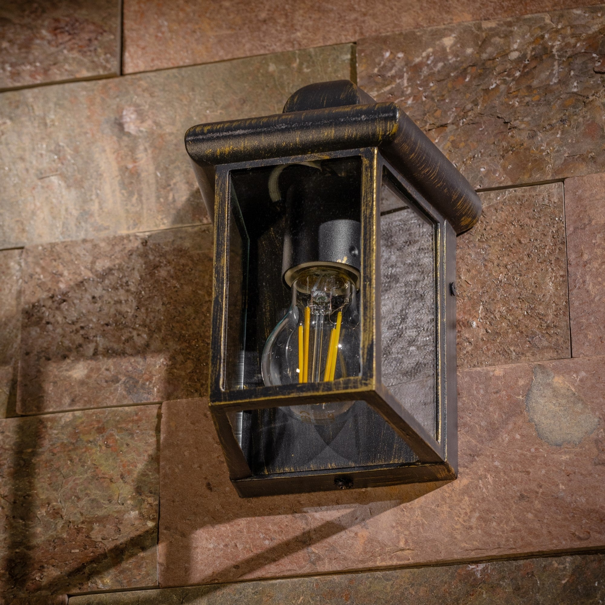 Our Camila wall lantern light is styled with a sophisticated black and bronze colour scheme, allowing the wall light to fit into any home’s style. What’s more, the lantern’s design is a modern take on a traditional styled wall light, creating a flexible look for interior and exterior use.&nbsp;