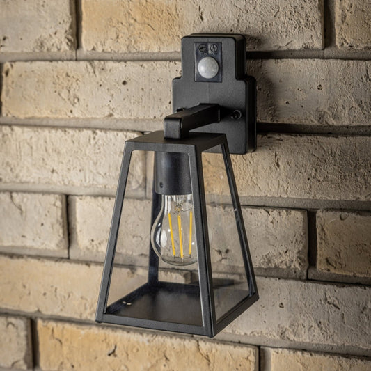 If you’re looking for a modern take on a traditional outdoor wall light, this black aluminium triangular wall light is perfect for adding style and protection for your home. This classic design with a contemporary twist, styled with a metal triangle shape and fitted with clear diffusers<span style="font-weight: 400;" data-mce-fragment="1" data-mce-style="font-weight: 400;"> also contains an imposing black finish, making it ideal for any home design - adding a statement to any wall it fits in</span>