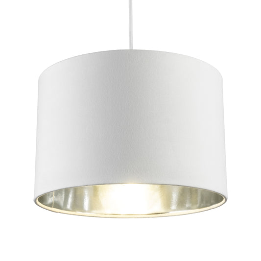 Our Nila velvet shade is sophisticated in appearance and we have designed the shade to  suit a range of interiors. Easy to fit, it’s crafted from high-quality velvet on the outer and has a reflective Silver metallic inner. It's made to fit both a ceiling light or lamp base.