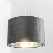 Our Nila velvet shade is sophisticated in appearance and we have designed the shade to  suit a range of interiors. Easy to fit, it’s crafted from high-quality velvet on the outer and has a reflective silver metallic inner. It's made to fit both a ceiling light or lamp base.