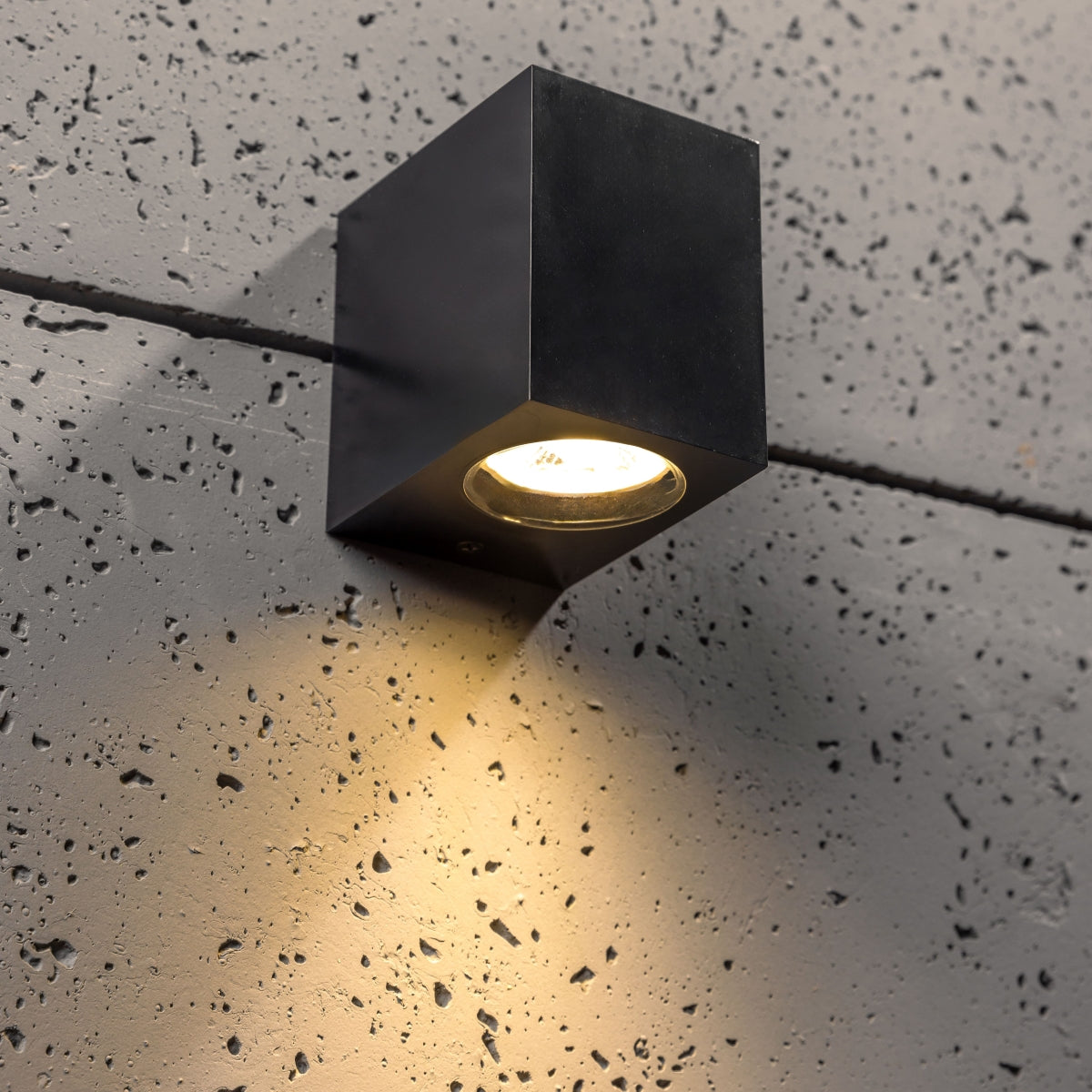 Our Eileen black wall mounted rectangle outdoor light would look perfect in a modern or more traditional home design. Outside wall lights can provide atmospheric light in your garden, at the front door or on the terrace as well as a great security solution. It is designed for durability and longevity with its robust material producing a fully weatherproof and water resistant light fitting.
