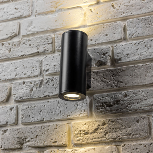 Our Sherri up and down black cylinder wall light would look perfect in a modern or more traditional home design. Outside lights can provide atmospheric light in your garden, at the front door, patio, walls driveway or on the terrace as well as a great security solution. It is designed for durability and longevity with its robust material producing a fully weatherproof and water resistant light fitting. 