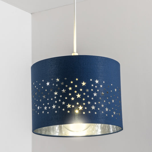 The Stardust luxury navy fabric star pendant shade would make a charming touch to your room. Constructed from a high quality soft navy cotton material with intricate laser cut stars in various sizes making a stunning effect in the room when lit. This easy fit non electrical pendant lampshade and can simply be fitted over any standard light fitting or table lamp.