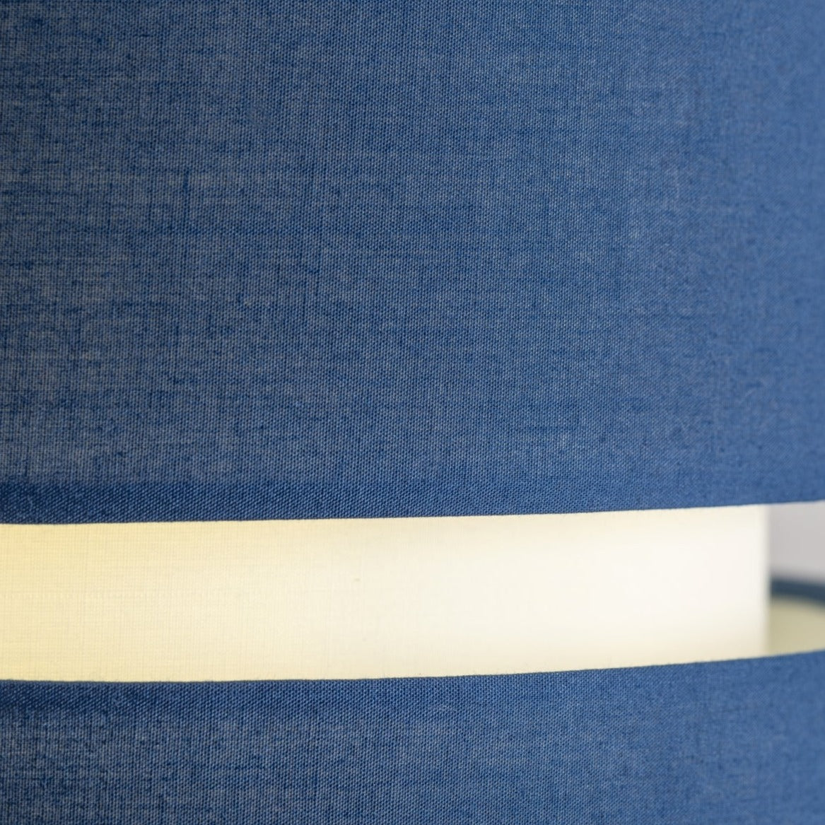 Our Gayle easy fit two tiered luxury fabric double layered shade is contemporary in its appearance and we have designed the shade to suit a range of interiors. Easy to fit simply attached to an existing pendant flitting.  It is crafted from high quality fabric material in two layers and complimented with a white inner which looks beautiful when light shines through. The shade has been made to fit both a ceiling light or lamp base.