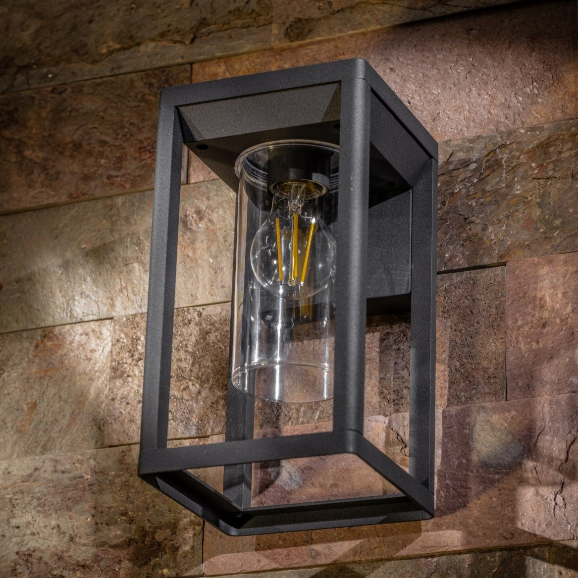 If you’re looking for a modern take on a traditional outdoor wall light, this modern anthracite lantern light with clear diffuser wall light is perfect for adding style and protection for your home. This classic wall light is designed with a contemporary twist, styled with a rectangle shape and fitted with clear diffuser that allow the light to shine effectively. 