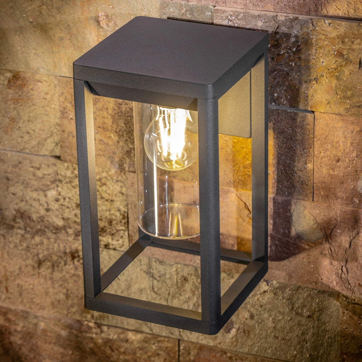 If you’re looking for a modern take on a traditional outdoor wall light, this modern anthracite lantern light with clear diffuser wall light is perfect for adding style and protection for your home. This classic wall light is designed with a contemporary twist, styled with a rectangle shape and fitted with clear diffuser that allow the light to shine effectively. 