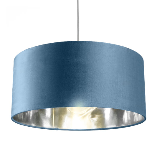 Our stunning oversized Teal blue/green Milano Lamp shade offers a timeless update to any room. The outer is made from high-quality velvet and the lining is reflective silver for a stylish finish. It’s easy to install and will instantly transforms your ceiling fitting, table or floor lamp.
