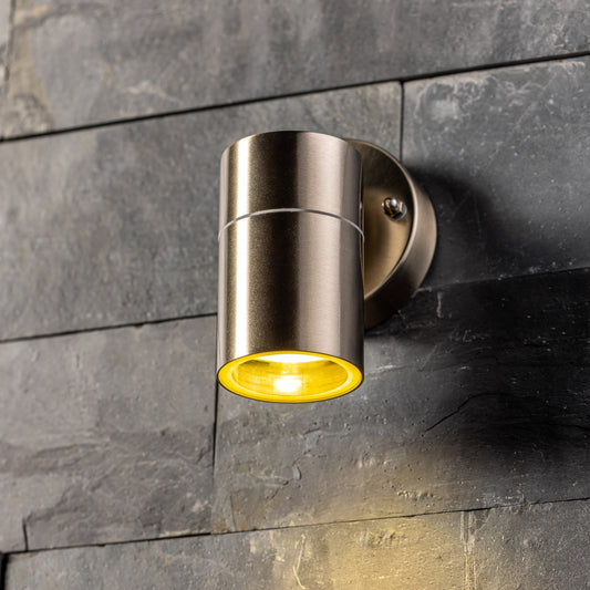 Our Alesha outdoor single down light is modern and stylish in its appearance.  It comes in a cylinder design mounted on a circular back plate. It is designed for durability and longevity with its robust material producing a fully weatherproof and water resistant light fitting