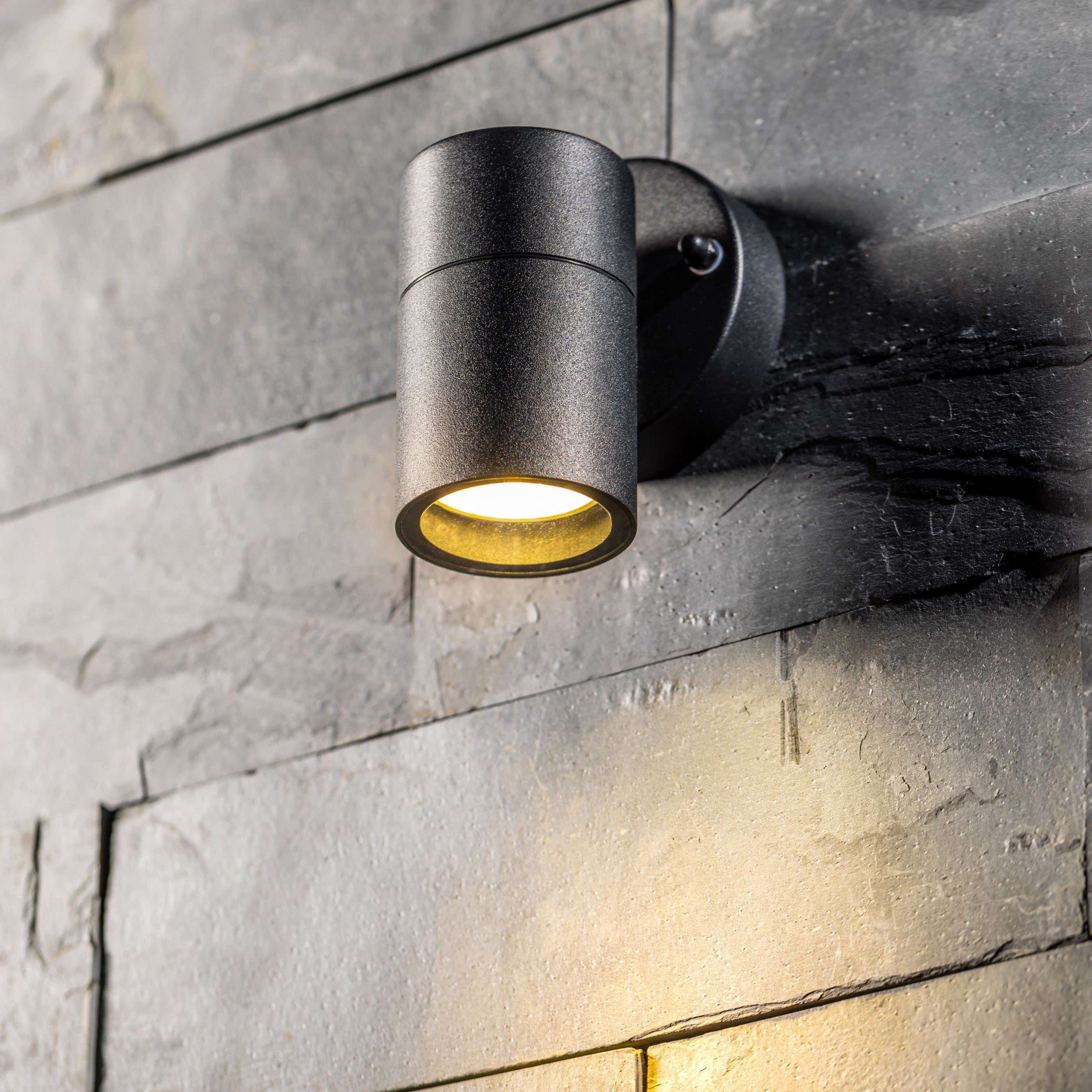 Our Leon outdoor single down light is modern and stylish in its appearance.  It comes in a cylinder design mounted on a circular back plate and clear glass diffuser. It is designed for durability and longevity with its robust material producing a fully weatherproof and water resistant light fitting