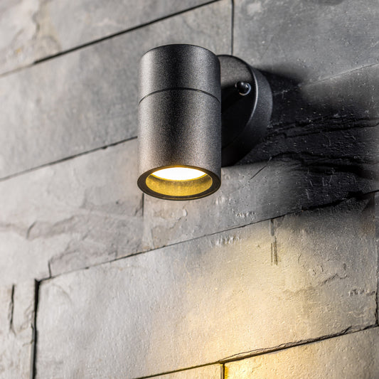Our Leon outdoor single down light is modern and stylish in its appearance.  It comes in a cylinder design mounted on a circular back plate and clear glass diffuser. It is designed for durability and longevity with its robust material producing a fully weatherproof and water resistant light fitting
