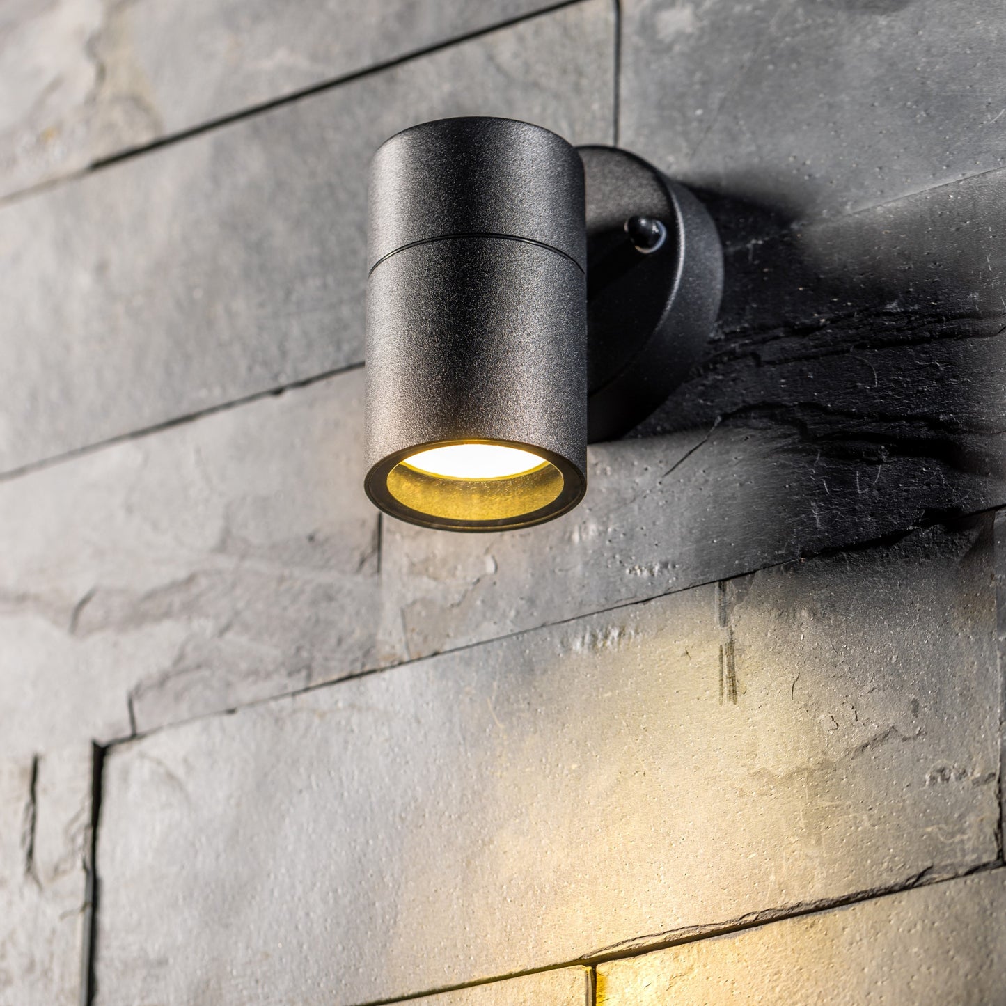 Our Leon outdoor single down light is modern and stylish in its appearance.  It comes in a cylinder design mounted on a circular back plate and clear glass diffuser. It is designed for durability and longevity with its robust material producing a fully weatherproof and water resistant light fitting