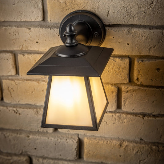 If you’re looking for a modern take on a traditional outdoor wall light, this black aluminium triangle wall light is perfect for adding style and protection for your home. This classic design with a contemporary twist, styled with a metal triangle shape and fitted with opal diffusers also contains an imposing black finish