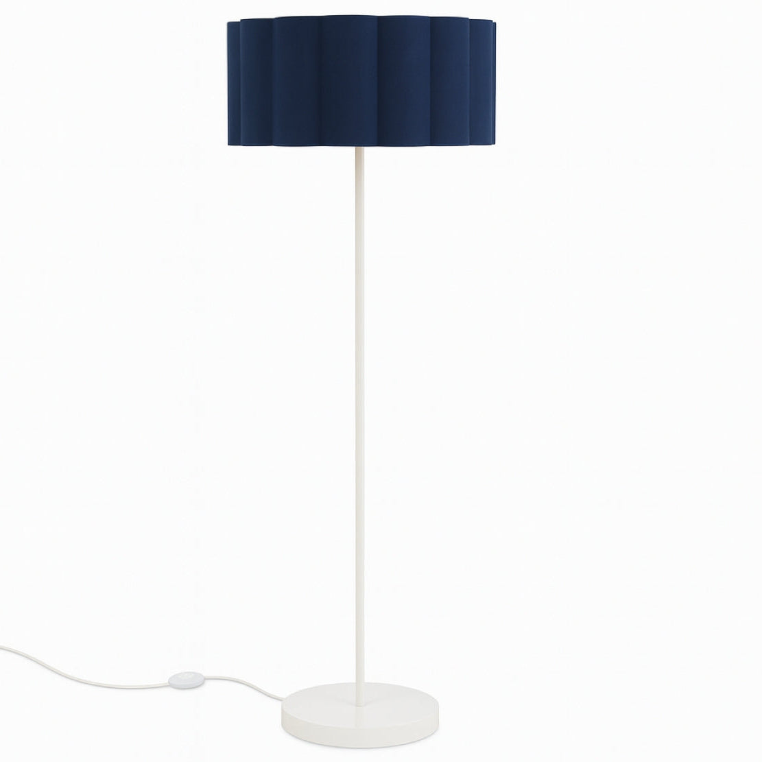 Floor lamp with a dark blue shade and white base on a white background