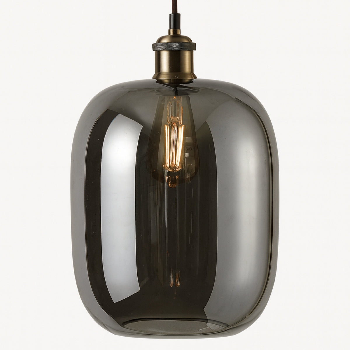 Smoked glass pendant light with brass fixture on a white background