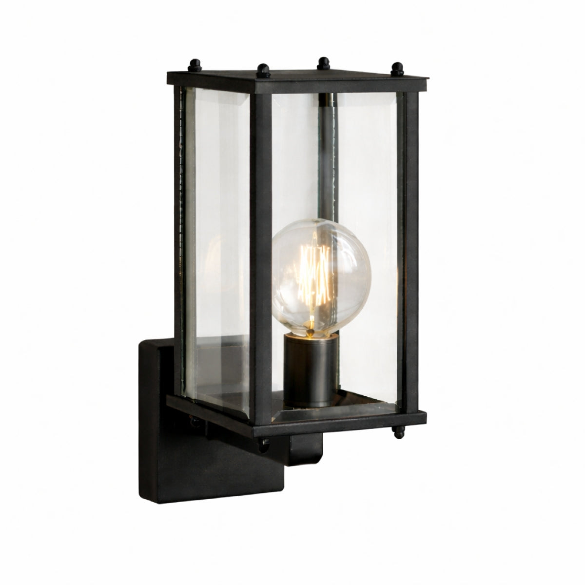Black outdoor wall light fixture with clear glass cover on a white background