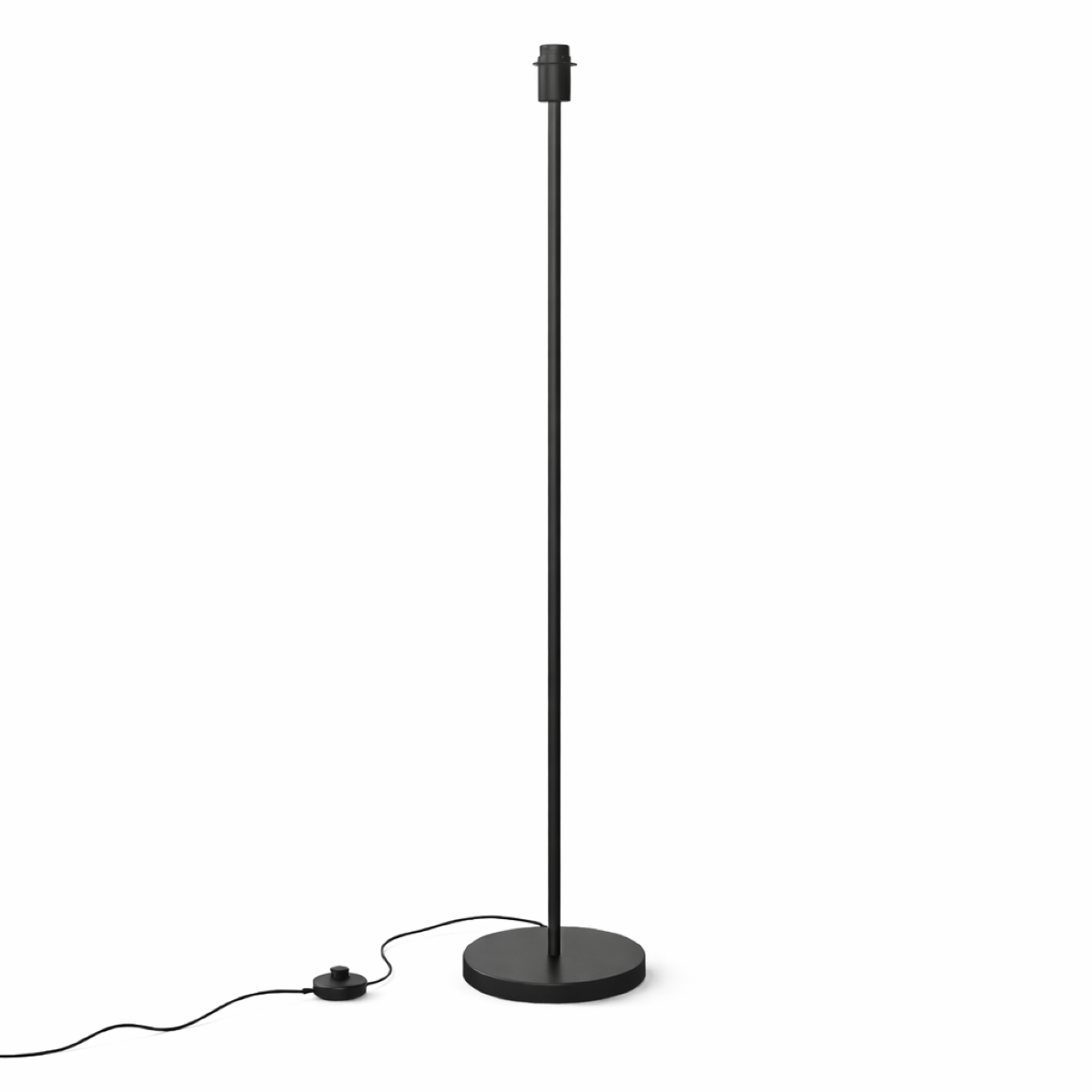 Black floor lamp with round base on a white background