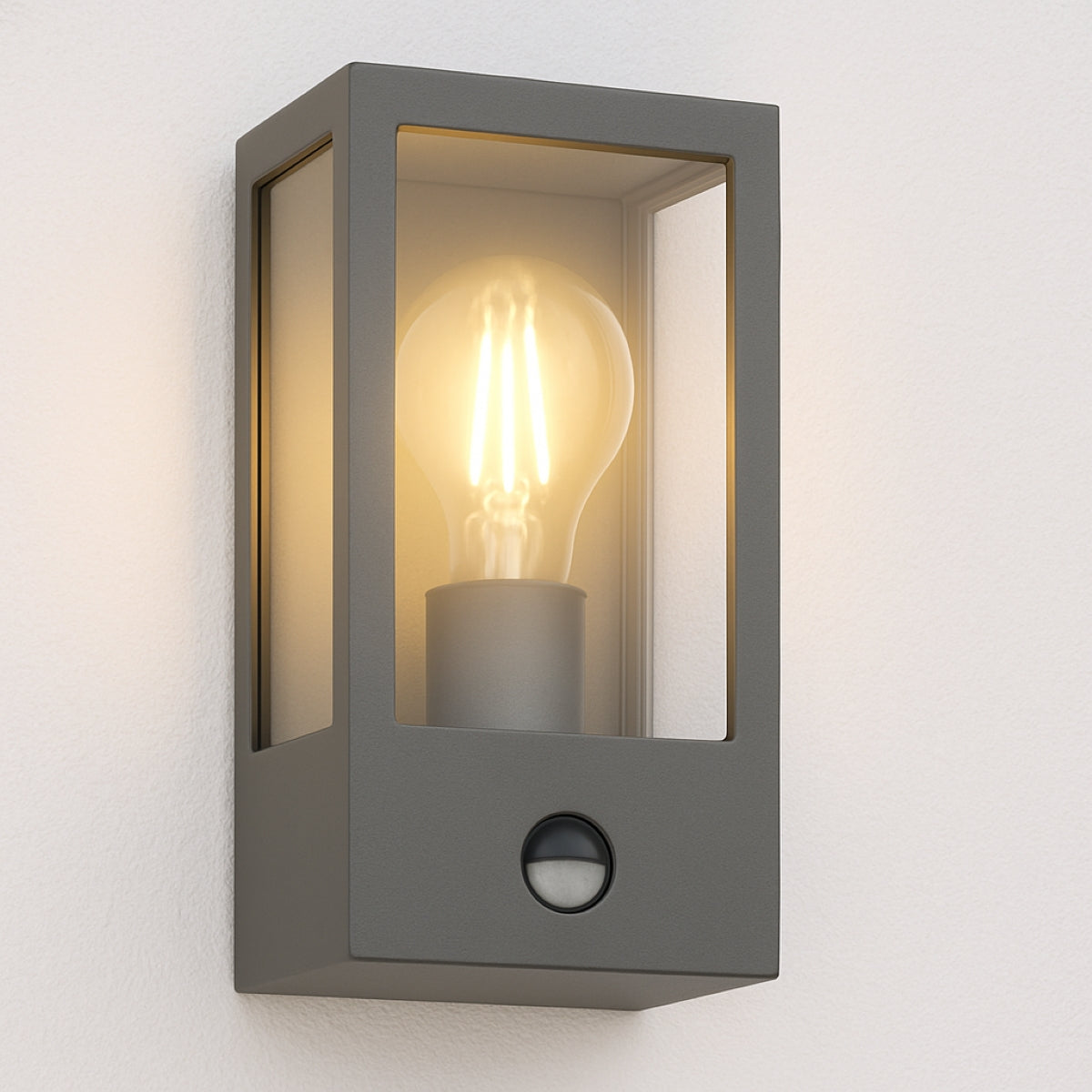 Gray outdoor wall light fixture with a bulb inside on a white background