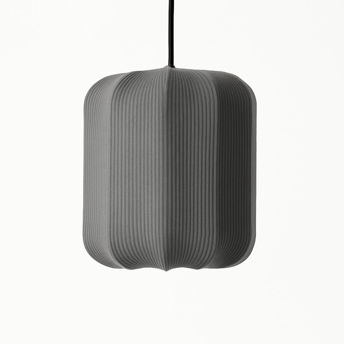 Gray pendant lamp with a ribbed texture on a white background